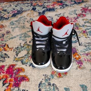 Jordan's size 7y in boys grey, white, red and black